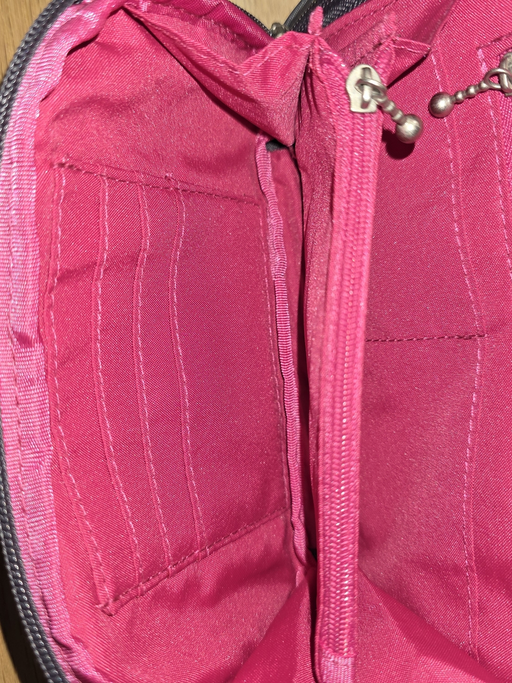 Baggallini Black Crossbody Belt Bag with Pink Accent - Picture 5 of 6